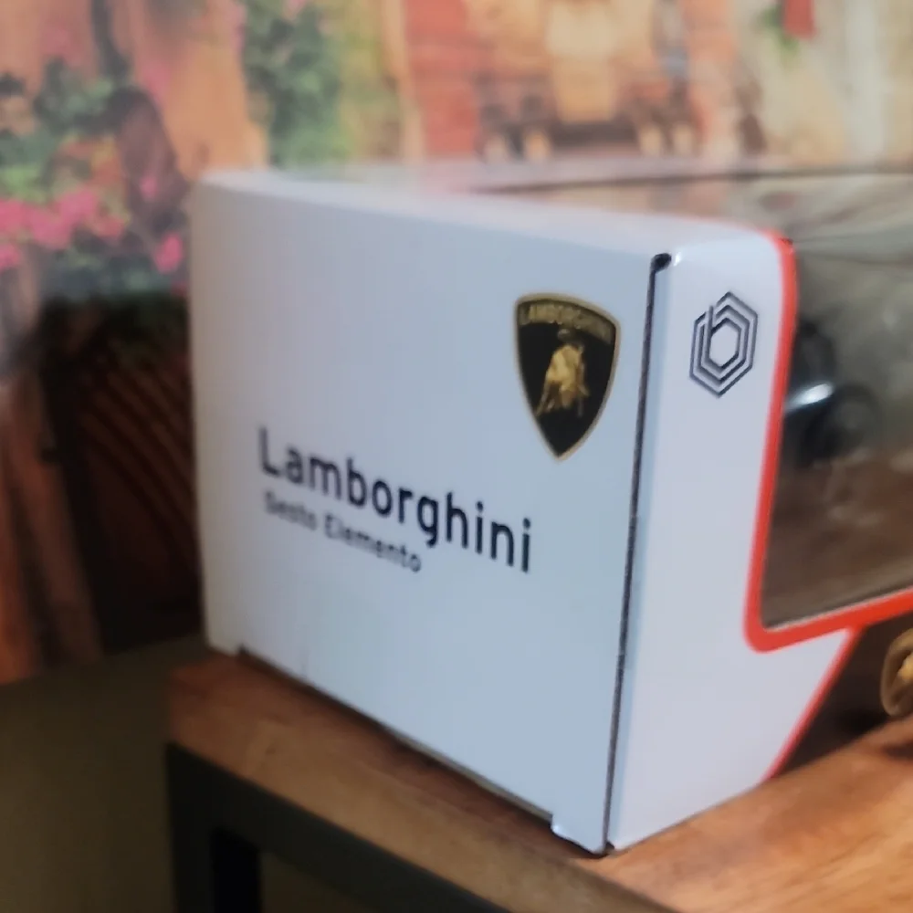 Lamborghini Sesto Elemento Black with Red Accents 1:24 scale